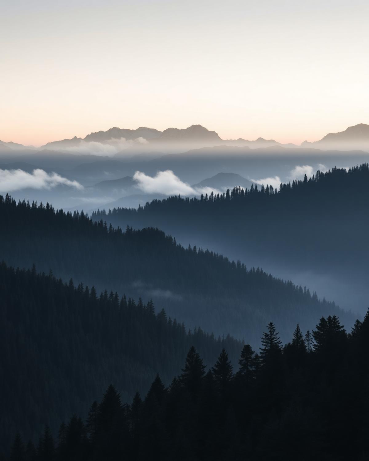 Layered mountain ridges at dawn
