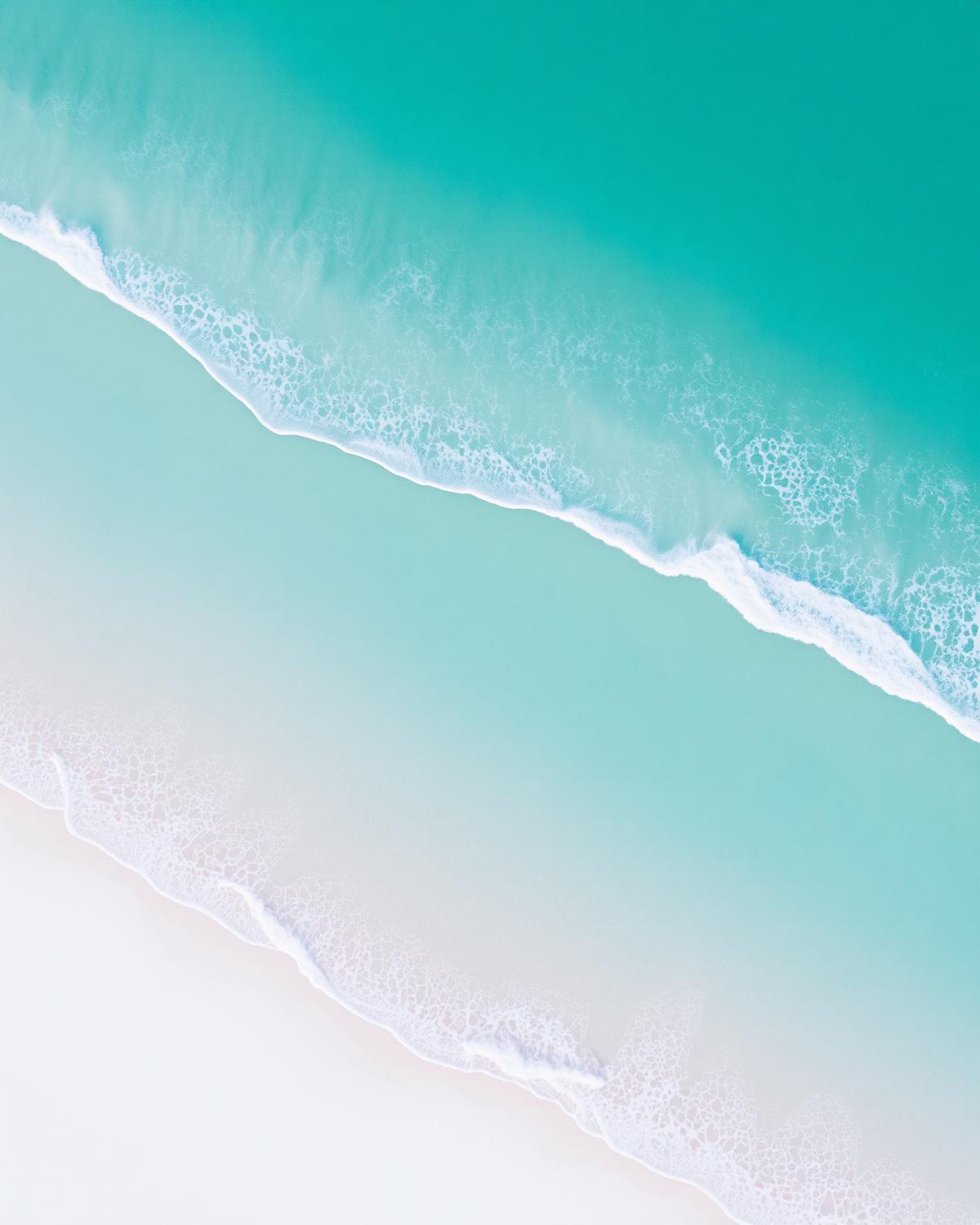 Turquoise Gulf water meeting white sand near Belleair Beach